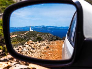 View of Kythira Lighthouse through wing mirror
