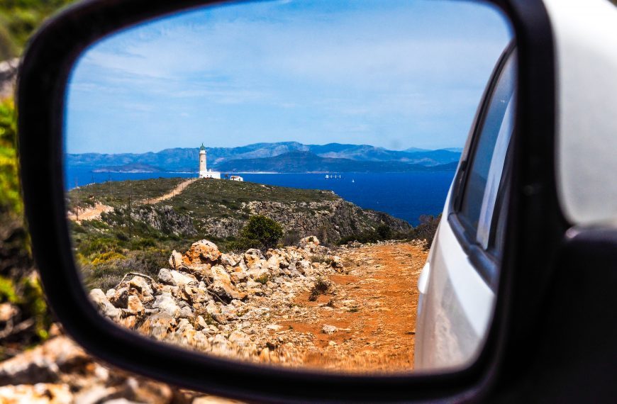 View of Kythira Lighthouse through wing mirror