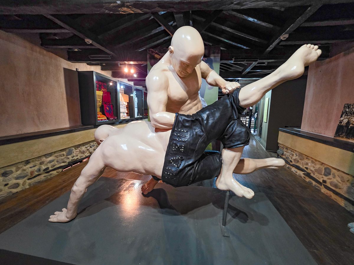 Scene of Greek oil wrestlers at Sochos Museum, near Thessaloniki