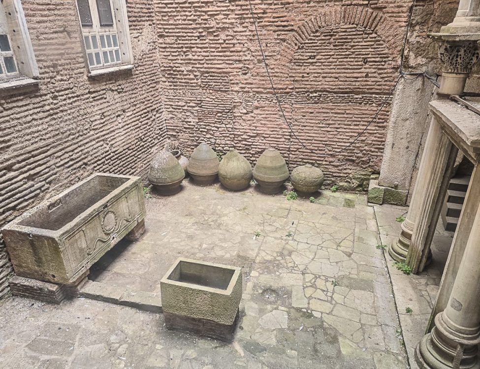 Sarcophagus and Clay Pots