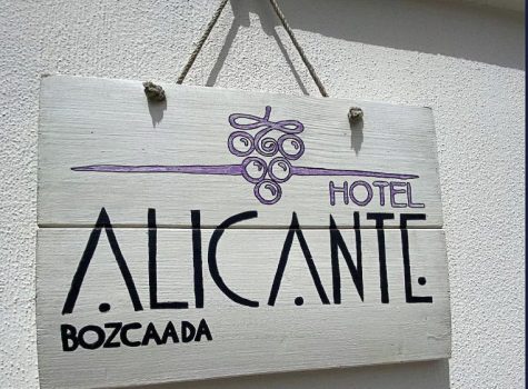 Signage at the front of the Alicante Hotel on Bozcaada